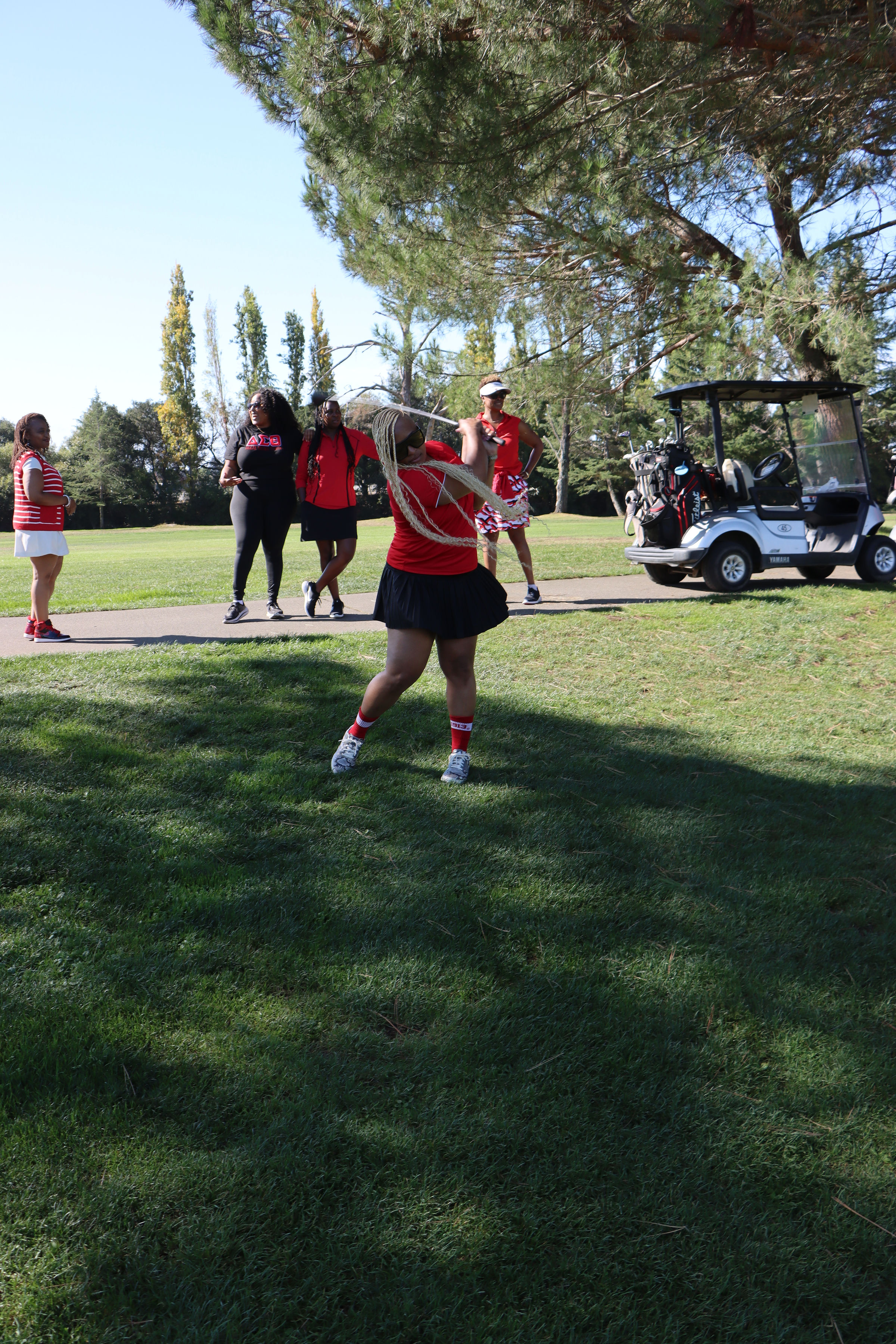 Golfer mid-swing