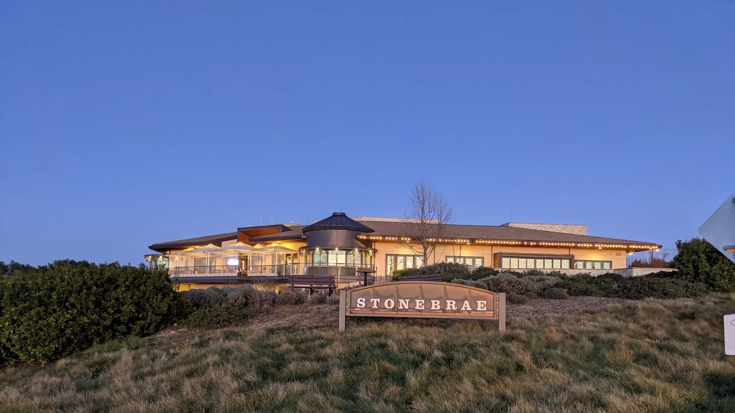 Stonebrae Country Club clubhouse at dusk
